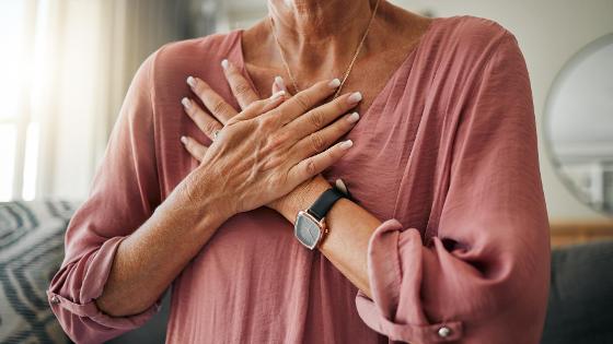57919351-senior-woman-hands-or-chest-pain-in-heart-attack.jpg
