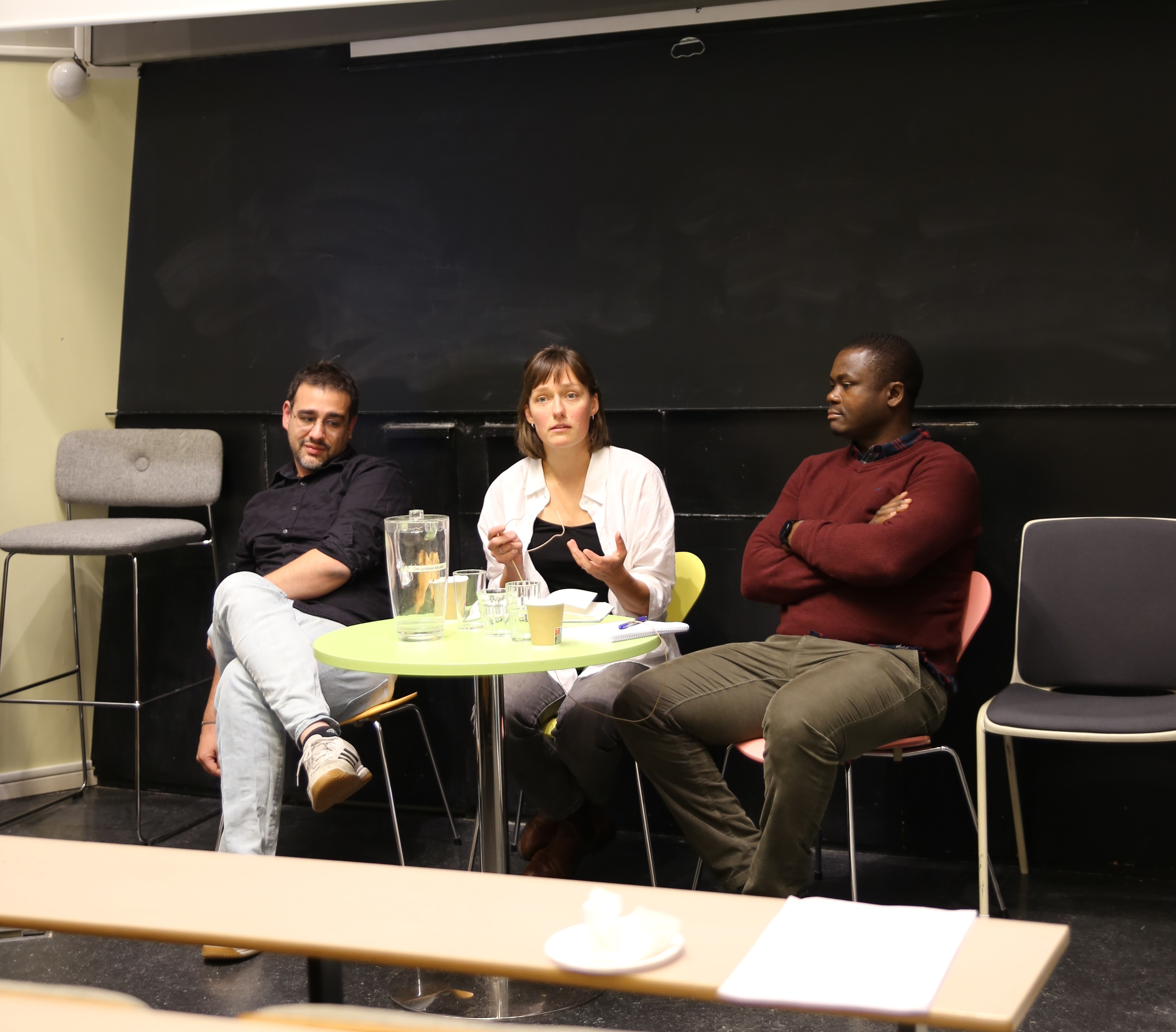 Sofie, Gilbert and Nikoalos, participants at the seminar, are recieving questions from the audience during a panel discussion