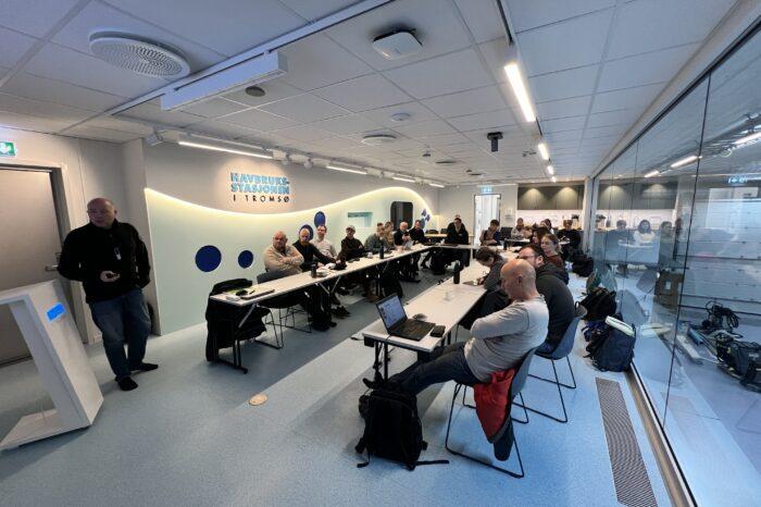 Prof. Bjørn-Steinar Sæther and CanRAS course participants in the meeting room of the new RAS facility at Tromsø Aquaculture Research Station. Photo: Are Homann-Danielsen