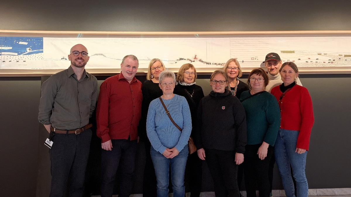 Gruppebilde av seks personer, studenter og forelesere. 