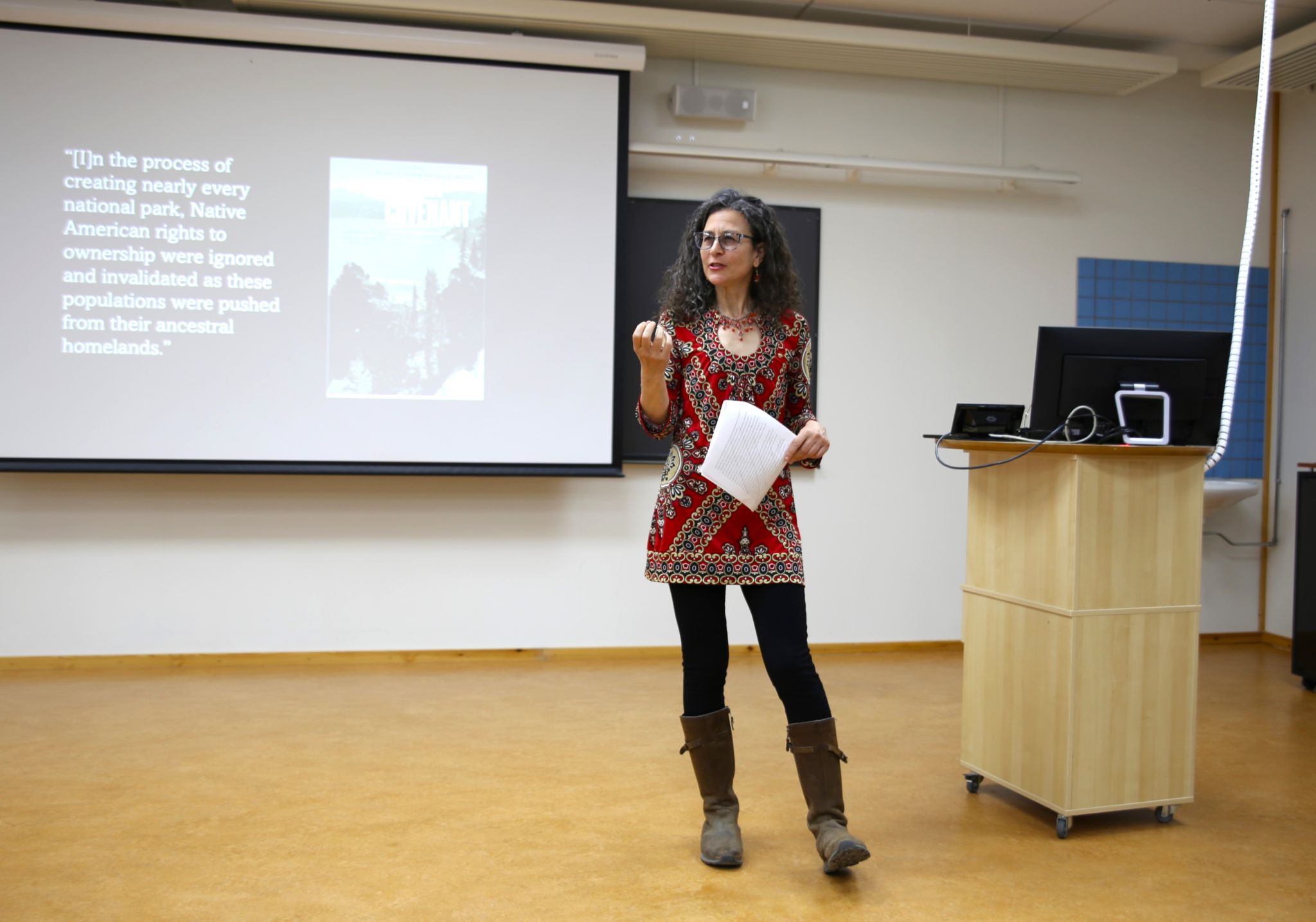 Picture of Irus Braverman talking to an audience with eagerness
