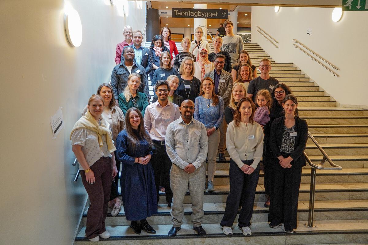 people in a gropu photo. 
