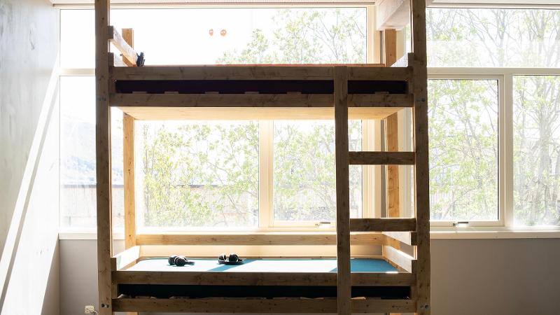 bunkbed with headphones laying in it